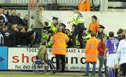 3 May 2010; Gardai intervene after Shamrock Rovers supporters halted the game for a number of minutes. Airtricity League Premier Division, Dundalk v Shamrock Rovers, Oriel Park, Dundalk. Photo by Sportsfile