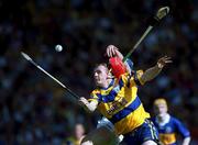 3 June 2001; Brian Lohan of Clare loses his helmet in a tussle for possession with John Leahy of Tipperary, which caused John Leahy's injury, during the Guinness Munster Senior Hurling Championship Semi-Final match between Tipperary and Clare at Páirc Uí Chaoimh in Cork. Photo by Ray McManus/Sportsfile