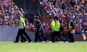 3 June 2001; John Leahy of Tipperary is stretchered off with a knee injury during the Guinness Munster Senior Hurling Championship Semi-Final match between Tipperary and Clare at Páirc Uí Chaoimh in Cork. Photo by Brendan Moran/Sportsfile