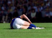 3 June 2001; John Leahy of Tipperary lays injured with a knee injury during the Guinness Munster Senior Hurling Championship Semi-Final match between Tipperary and Clare at Páirc Uí Chaoimh in Cork. Photo by Ray McManus/Sportsfile