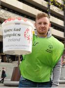 22 April 2016; 3,000 volunteers are out in force across Ireland today, Friday 22nd, trying to raise €650,000 for Special Olympics in just 24 hours. All of the funds raised go towards supporting 9,100 athletes right across Ireland. Collection locations in 250 villages, towns and cities in Ireland. Visit specialolympics.ie to donate and for more details. Pictured is eir employee Ollie Collins, Lucan, Co. Dublin. Special Olympics Collection Day. Dublin. Picture credit: Seb Daly / SPORTSFILE