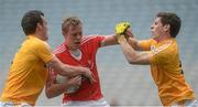 23 April 2016; Jim McEneaney, Louth, in action against James Laverty, left, and Kevin O'Boyle, Antrim. Allianz Football League, Division 4, Final, Louth v Antrim. Croke Park, Dublin. Picture credit: Piaras Ó Mídheach / SPORTSFILE