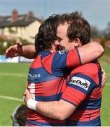 23 April 2016; Evan Ryan, Clontarf, hugs team-mate Mick McGrath after the match. Ulster Bank League, Division 1A, semi-final, Clontarf v UCD. Castle Avenue, Clontarf, Co. Dublin. Picture credit: Cody Glenn / SPORTSFILE