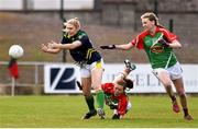 23 April 2016; Laura Rogers, Kerry, is tackled by Sarah Tierney, supported by Nicola O'Malley, Mayo. Lidl Ladies Football National League, Division 1, semi-final, Mayo v Kerry. St Brendan's Park, Birr, Co. Offaly. Picture credit: Ramsey Cardy / SPORTSFILE