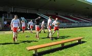 8 May 2010; The Tyrone squad make their way onto the pitch before the game to empty stands. Ulster GAA Hurling Senior Championship, First Round, Tyrone v Cavan, Healy Park, Omagh, Co. Tyrone. Picture credit: Oliver McVeigh / SPORTSFILE