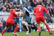 9 May 2010; Maama Molitika, Cardiff Blues, charging through the Munster defence. Celtic League, Cardiff Blues v Munster, Cardiff City Stadium, Cardiff, Wales. Picture credit: Steve Pope / SPORTSFILE