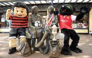 11 May 2010; South Dublin and North Dublin go head-to-head in the Setanta Sports Cup final this Saturday when St. Patrick’s Athletic face Bohemians in Tallaght Stadium (kick-off 6.30pm). The two club mascots – Paddy the Panther and Dennis the Menace – met on the Ha’Penny Bridge today to discuss the big match. Tickets for the Setanta Sports Cup Final are available from Dalymount Park and Richmond Park and are priced priced €20 for adults and €5 for OAPs and Under-16s. The Ha'penny Bridge, Dublin. Photo by Sportsfile