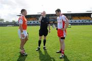 15 May 2010; Referee Owen Elliott with Armagh captain Paul McCormack and Tyrone captain Damien Maguire. Ulster GAA Hurling Senior Championship Second Round, Armagh v Tyrone, Casement Park, Belfast. Picture credit: Oliver McVeigh / SPORTSFILE