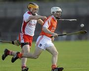 15 May 2010; Cathal Carvil, Armagh, in action against Justin Kelly, Tyrone. Ulster GAA Hurling Senior Championship Second Round, Armagh v Tyrone, Casement Park, Belfast. Picture credit: Oliver McVeigh / SPORTSFILE