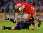 15 May 2010; Damien Varley, Munster, is tackled by John Fogarty, Leinster. Celtic League Semi-Final, Leinster v Munster, RDS, Dublin. Picture credit: Stephen McCarthy / SPORTSFILE
