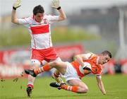 16 May 2010; James King, Armagh, in action against Benny Quigg, Derry. ESB Ulster GAA Football Minor Championship, Derry v Armagh, Celtic Park, Derry. Photo by Sportsfile