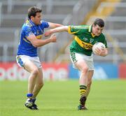 16 May 2010; Alan O'Sullivan, Kerry, in action against Liam O'Gorman, Tipperary. Munster GAA Football Junior Championship Quarter-Final, Kerry v Tipperary, Semple Stadium, Thurles, Co. Tipperary. Picture credit: Brendan Moran / SPORTSFILE