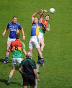 16 May 2010; Thomas Walsh, Carlow, goes up for the ball with former team-mate Wicklow's Don Jackman at the start of the game. Leinster GAA Football Senior Championship Preliminary Round, Wicklow v Carlow, O'Moore Park, Portlaoise, Co. Laoise. Picture credit: Matt Browne / SPORTSFILE