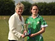 16 May 2010; Ann Dalton, Leinster, receives the the Provincial Cup from Joan Flynn. 2010 Gael Linn Senior Inter-Provincial Championship Camogie Final, Munster v Leinster, Trim GAA Club, Trim, Co. Meath. Picture credit: Barry Cregg / SPORTSFILE