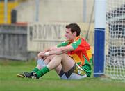 16 May 2010; Carlow's Thomas Walsh sits on the side line after he was sent off by referee Gearoid O Conamha. Leinster GAA Football Senior Championship Preliminary Round, Wicklow v Carlow, O'Moore Park, Portlaoise, Co. Laoise. Picture credit: Matt Browne / SPORTSFILE