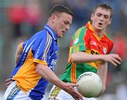 16 May 2010; Leighton Glynn, Wicklow, in action against Paul McElligot, Carlow. Leinster GAA Football Senior Championship Preliminary Round, Wicklow v Carlow, O'Moore Park, Portlaoise, Co. Laoise. Picture credit: Matt Browne / SPORTSFILE