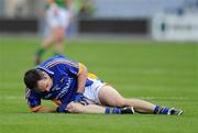16 May 2010; Patrick McWalter, Wicklow, holds his knee before leaving the field. Leinster GAA Football Senior Championship Preliminary Round, Wicklow v Carlow, O'Moore Park, Portlaoise, Co. Laoise. Picture credit: Matt Browne / SPORTSFILE