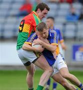 16 May 2010; Paul Earls, Wicklow, in action against Thomas Walsh, Carlow. Leinster GAA Football Senior Championship Preliminary Round, Wicklow v Carlow, O'Moore Park, Portlaoise, Co. Laoise. Picture credit: Matt Browne / SPORTSFILE