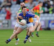 16 May 2010; Brian McGrath, Wicklow, in action against JJ Smith, Carlow. Leinster GAA Football Senior Championship Preliminary Round, Wicklow v Carlow, O'Moore Park, Portlaoise, Co. Laoise. Picture credit: Matt Browne / SPORTSFILE