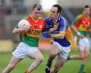 16 May 2010; Mark Carpenter, Carlow, in action against Patrick McWalter, Wicklow. Leinster GAA Football Senior Championship Preliminary Round, Wicklow v Carlow, O'Moore Park, Portlaoise, Co. Laoise. Picture credit: Matt Browne / SPORTSFILE