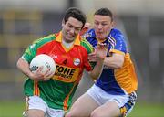 16 May 2010; Benny Kavanagh, Carlow, in action against Leighton Glynn, Wicklow. Leinster GAA Football Senior Championship Preliminary Round, Wicklow v Carlow, O'Moore Park, Portlaoise, Co. Laoise. Picture credit: Matt Browne / SPORTSFILE