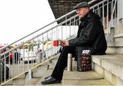 29 April 2016; Bookmaker Gerry Collins, from Drogheda, Co. Louth, relaxes with a cup of tea and a sandwich ahead of Day 4 at Punchestown Festival. Punchestown, Co. Kildare. Picture credit: Seb Daly / SPORTSFILE