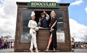 29 April 2016; Niamh Cunningham, right, from Crossmaglen, Co. Armagh, and her friend Karen Hanratty, also from Crossmaglen, with George Bryan, from Dalkey, Co. Dublin, who sells and hires out binoculars ahead of the races. Punchestown, Co. Kildare. Picture credit: Cody Glenn / SPORTSFILE