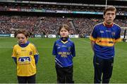 24 April 2016; Juliet van der Wel, centre, Co. Wicklow, reading a line of the Proclamation during the Laochra entertainment performance after the Allianz Football League Final. Allianz Football League Finals, Croke Park, Dublin.  Picture credit: Brendan Moran / SPORTSFILE