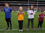 24 April 2016; Mary Kate Bonnes, 2nd from left, Co. Antrim, reading a line of the Proclamation during the Laochra entertainment performance after the Allianz Football League Final. Allianz Football League Finals, Croke Park, Dublin.  Picture credit: Brendan Moran / SPORTSFILE