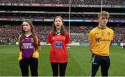 24 April 2016; Kerri Halpenny, centre, Co. Louth, reading a line of the Proclamation during the Laochra entertainment performance after the Allianz Football League Final. Allianz Football League Finals, Croke Park, Dublin.  Picture credit: Brendan Moran / SPORTSFILE