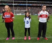 24 April 2016; Sarah Nyhan, centre, Co. Waterford, reading a line of the Proclamation during the Laochra entertainment performance after the Allianz Football League Final. Allianz Football League Finals, Croke Park, Dublin.  Picture credit: Brendan Moran / SPORTSFILE