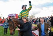 29 April 2016; Jockey Nina Carberry give the thumbs-up to the crowd as she enters the winner's enclosure after winning the Racing Post Champion Hunters Steeplechase on On The Fringe. Punchestown, Co. Kildare. Picture credit: Seb Daly / SPORTSFILE