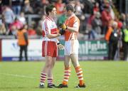 16 May 2010; Dermot McBride, Derry, shakes hands with Steven McDonnell, Armagh, after the final whistle. Ulster GAA Football Senior Championship - Preliminary Round, Derry v Armagh, Celtic Park, Derry. Picture credit: Oliver McVeigh / SPORTSFILE