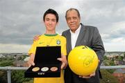 28 May 2010; Carlos Alberto Torres, captain of the 1970 Brazil World Cup winning team, was in Dublin to launch the Pele Goals for Life Cup competition on behalf of his great friend which will benefit the Little Prince Hospital in Curitiba, Brazil, and the New Children's Hospital of Ireland. The idea is to attract 100 teams from across Ireland to enter a National 5 a side competition and in the process raise funding to benefit both hospitals. The competition’s winning team will travel on a trip of a lifetime to the cradle of football, Brazil, to be guests of the legendary Pele at a Santos game at the famous Vila Belmiro Stadium. The winners will also visit the Little Prince Hospital and also have the opportunity to play a 5 a side game in Santos and Rio de Janeiro. Pictured at the launch is Carlos Alberto Torres with Conor Fitzpatrick, from Sandymount, Dublin. D4 Berkeley Hotel, Ballsbridge, Dublin. Picture credit: Brian Lawless / SPORTSFILE