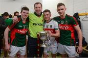 30 April 2016; Mayo players celebrate with the cup after the game. EirGrid GAA Football Under 21 All-Ireland Championship Final, Cork v Mayo. Cusack Park, Ennis, Co. Clare. Picture credit: Piaras Ó Mídheach / SPORTSFILE