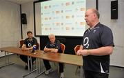 3 June 2010; Ireland head coach Declan Kidney, right, watched by forwards coach Gert Smal, left, and assistant coach Alan Gaffney, explains to the media that Keith Earls has been withdrawn from the tour due to injury and is to be replaced by Gavin Duffy, during a press conference ahead of their match against the Barbarians on Friday. Ireland Rugby Press Conference, Thomond Park, Limerick. Picture credit: Diarmuid Greene / SPORTSFILE