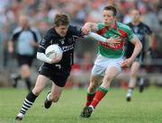 5 June 2010; David Kelly, Sligo, in action against Donal Vaughan, Mayo. Connacht GAA Football Senior Championship Quarter-Final, Sligo v Mayo, Markievicz Park, Sligo. Picture credit: Ray Ryan / SPORTSFILE