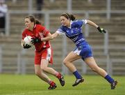 6 June 2010; Maria Donnelly, Tyrone, in action against Catriona McConnell, Monaghan. TG4 Ulster Ladies Football Senior Championship First Round, Tyrone v Monaghan, Casement Park, Belfast, Co. Antrim. Picture credit: Oliver McVeigh / SPORTSFILE