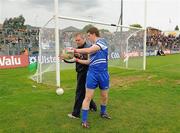 6 June 2010; Former Cavan goalkeeper, Paul O'Dowd, left, now Monaghan goalkeeping coach, issues instructions to stand in Monaghan goalkeeper Darren Hughes, originally picked at full-back, before the game. Ulster GAA Football Senior Championship Quarter-Final, Monaghan v Armagh, Casement Park, Belfast, Co. Antrim. Picture credit: Oliver McVeigh / SPORTSFILE