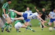 6 June 2010; Liam Ó Lionain, Waterford, in action against Mark O'Riordan and Padraig Browne, left, Limerick. Munster GAA Football Senior Championship Semi-Final, Waterford v Limerick, Fraher Field, Dungarvan, Co. Waterford. Picture credit: Brian Lawless / SPORTSFILE