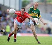 6 June 2010; Mike O'Donoghue, Kerry, in action against Colm O'Connell, Cork. Munster GAA Football Junior Championship Semi-Final, Kerry v Cork, Fitzgerald Stadium, Killarney, Co. Kerry. Picture credit: Brendan Moran / SPORTSFILE