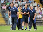 6 June 2010; Waterford manager John Owens speaks with his backroom staff on the way to the dressing room at half-time. Munster GAA Football Senior Championship Semi-Final, Waterford v Limerick, Fraher Field, Dungarvan, Co. Waterford. Picture credit: Brian Lawless / SPORTSFILE