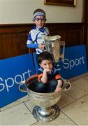 8 May 2016; Nathan Dolan, age 3, from Moate, Co. Westmeath, in the Sam Maguire cup, and Darragh Boland, age 6, from Clonea Power, Co. Waterford, with the Liam MacCarthy cup, pictured at the Launch of RTÉ GAA Championship coverage. Hayes Hotel, Thurles, Co Tipperary. Picture credit: Ray McManus / SPORTSFILE