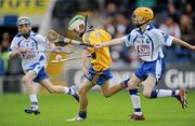 7 June 2010; Jack Cunningham, Clare, in action against Fionn Daly, Waterford, during the Go Games Half-Time match. Munster GAA Hurling Senior Championship Semi-Final, Waterford v Clare, Semple Stadium, Thurles, Co. Tipperary. Picture credit: Brendan Moran / SPORTSFILE