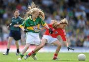 6 June 2010; Ciara Nevin, Cork, holds off the challenge of Saoirse Kelly, Kerry, during the Go Games Half-Time match. Munster GAA Football Senior Championship Semi-Final, Kerry v Cork, Fitzgerald Stadium, Killarney, Co. Kerry. Picture credit: Brendan Moran / SPORTSFILE