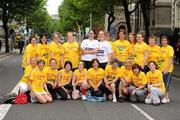 7 June 2010; Detective Garda Janet Walshe with Susan O'Sullivan, Special Olympics Eastern Region Development Officer, and Special Olympics Eastern Region Mini Marathon runners pictured with the Special Olympics’ Flame of Hope before the Women’s Mini Marathon. The torch is being carried throughout Ireland en route to Limerick for the 2010 Special Olympics Ireland Games which start on Wednesday 9th June. Dawson Street, Dublin. Picture credit: Ray McManus / SPORTSFILE