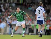 6 June 2010; Limerick's Ger Collins throws a water bottle to the sideline. Munster GAA Football Senior Championship Semi-Final, Waterford v Limerick, Fraher Field, Dungarvan, Co. Waterford. Picture credit: Brian Lawless / SPORTSFILE