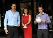 9 June 2010; Eileen Maher, Vodafone Ireland Fixed Services Director, with Cork's Aisake Ó hAilpín, left, and Down's Benny Coulter, winners of the Vodafone GAA Player of the Month Award for May in hurling and football respectively. Westbury Hotel, Dublin. Picture credit: Brian Lawless / SPORTSFILE