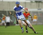 9 June 2010; Lorcan Broderick, Laois, in action against David English, Carlow. Bord Gais Energy Leinster GAA Hurling Under 21 Championship Semi-Final, Laois v Carlow, O'Moore Park, Portlaoise, Co. Laois. Picture credit: Barry Cregg / SPORTSFILE