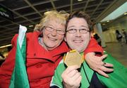 10 June 2010; Padraic Moran, from Bray, Co. Wicklow, celebrates with his mother Catherine Moran, on his return to Ireland after winning Gold in the BC1 Class at the CPISRA World Boccia Championships in Lisbon. The Bray local, sensationally beat home favourite Portugal’s Joao Paolo Fernandez by a score of 3:2 in a thrilling final at the Estádio Universitário in Lisbon’s University complex to take victory This is the end of a long Championship for Moran who earlier in the week led the Irish team to a 4th place finish in the BC1/BC2 combined team competition. Dublin Airport, Dublin. Picture credit: Brian Lawless / SPORTSFILE